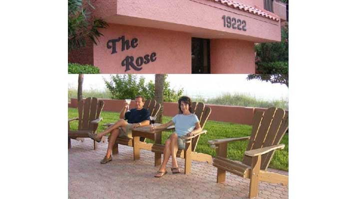 ITOF - The Rose Condo with two people sittnig in a wooden chairs